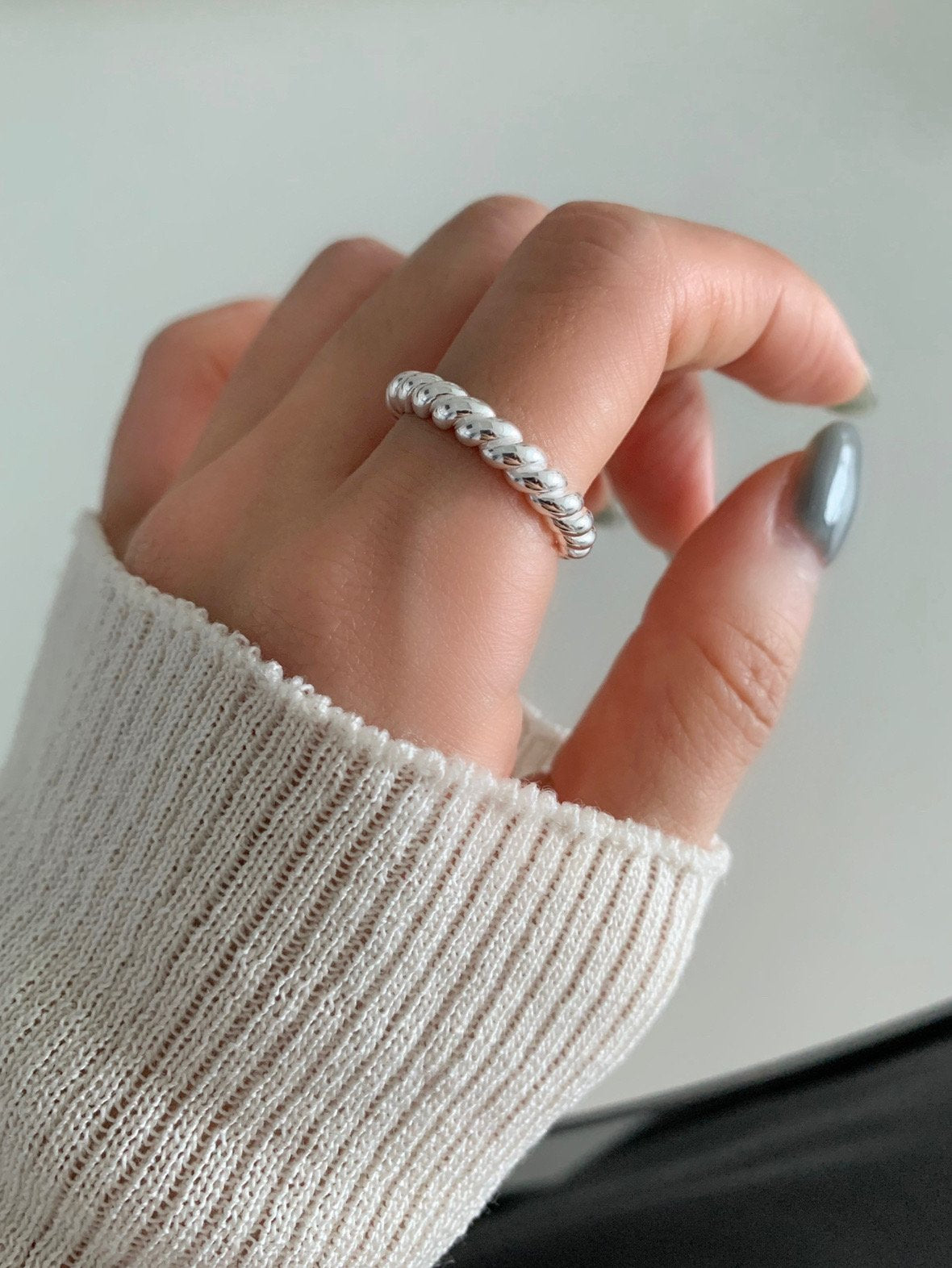 Twisted open ring
