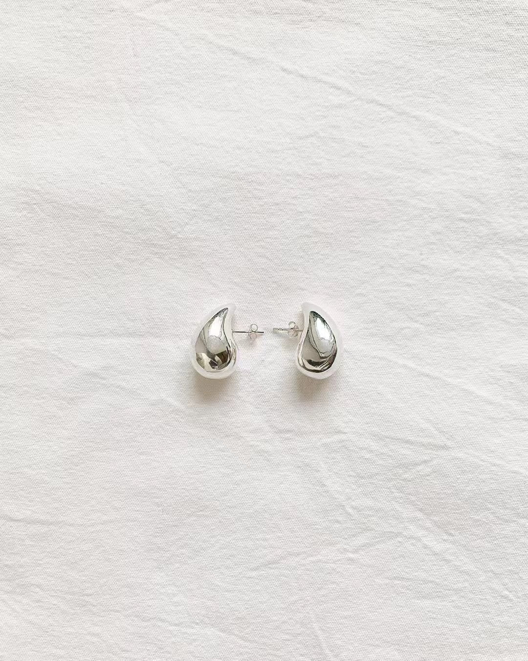 Ounce silver earring