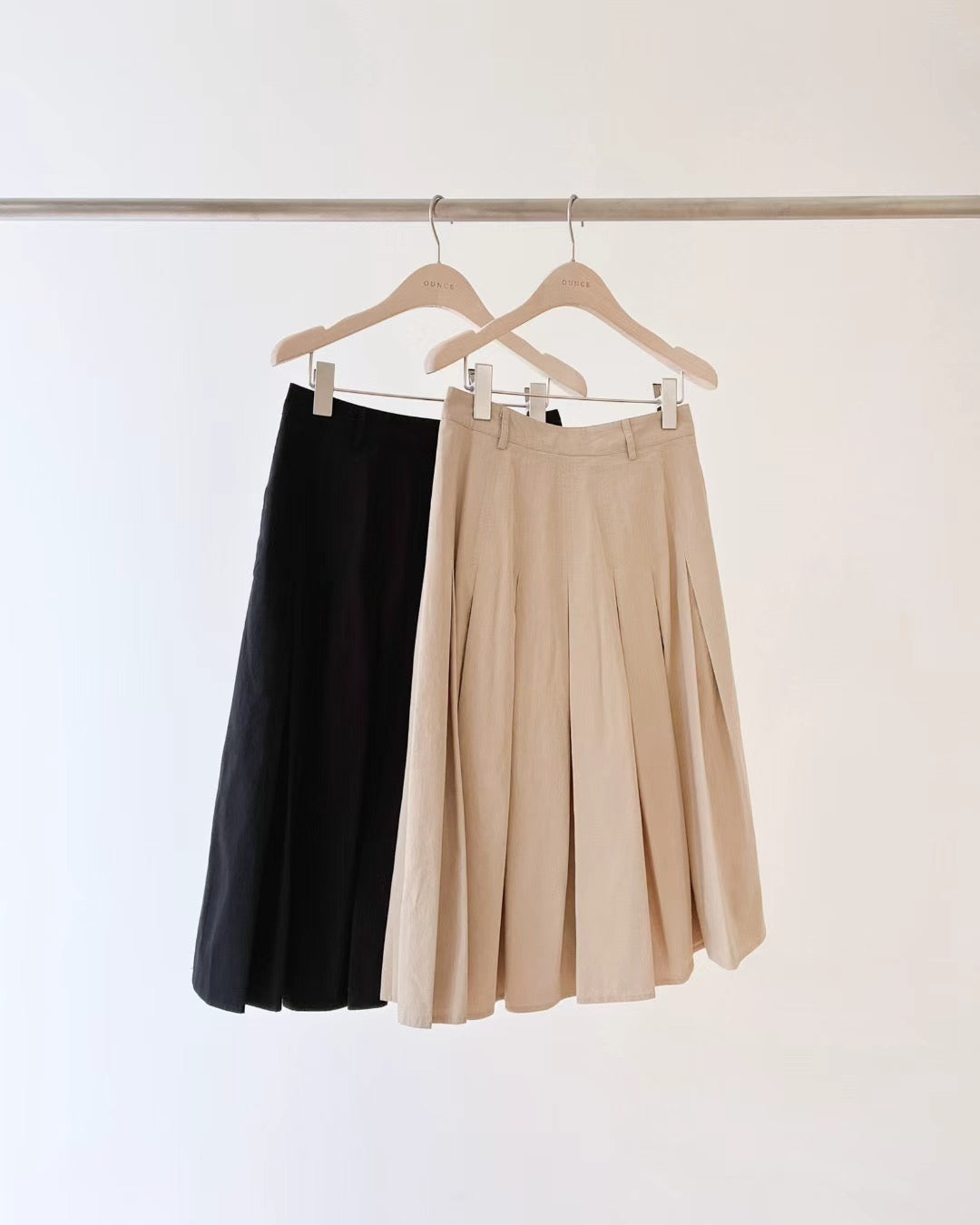 Ounce pocket pleats skirt-2col