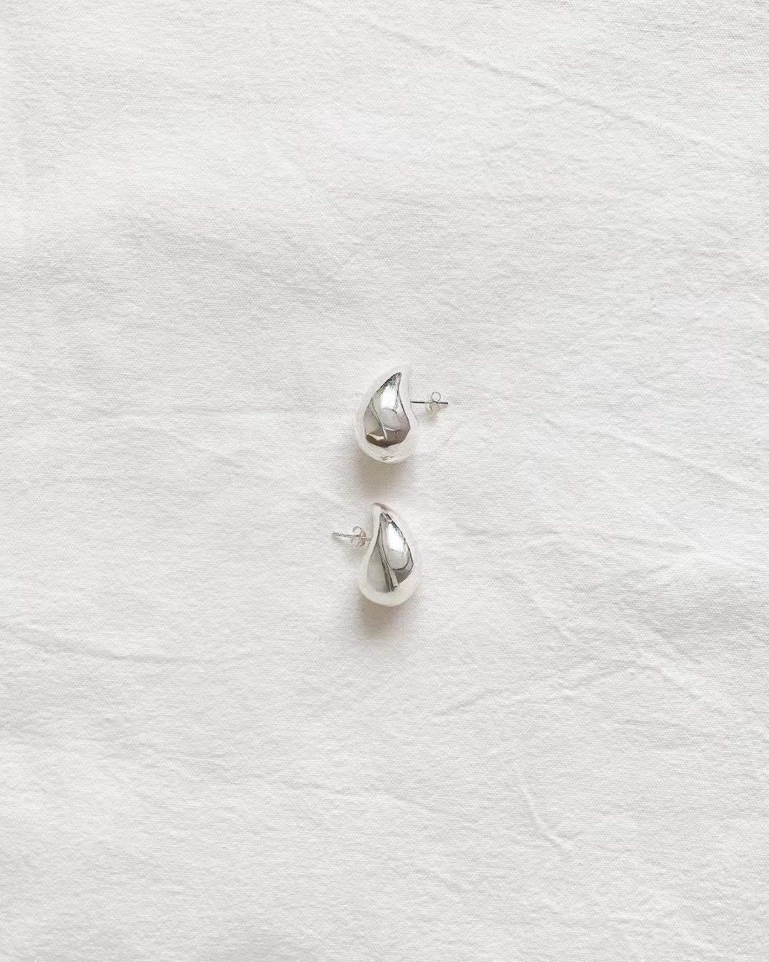 Ounce silver earring