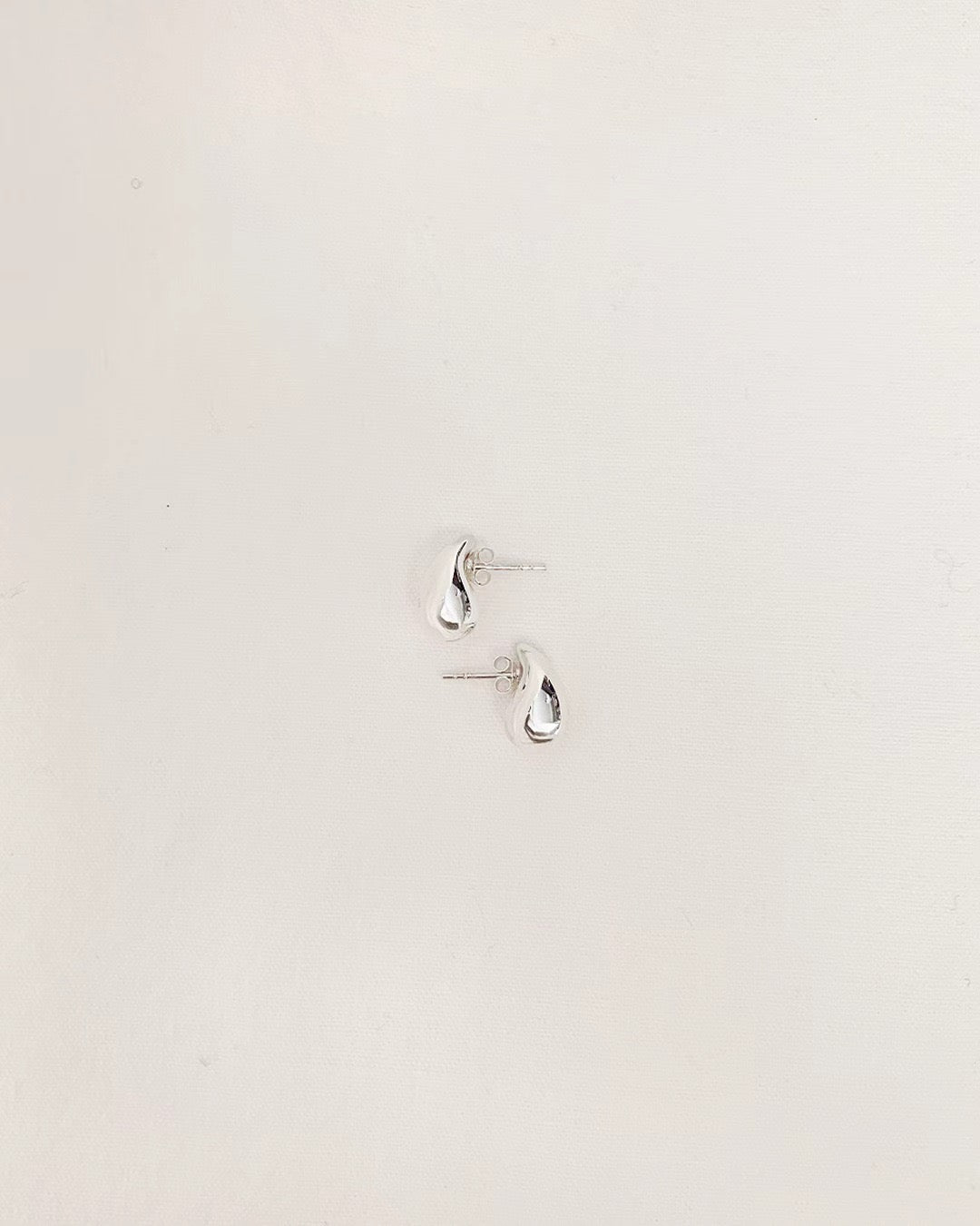 Ounce silver earring