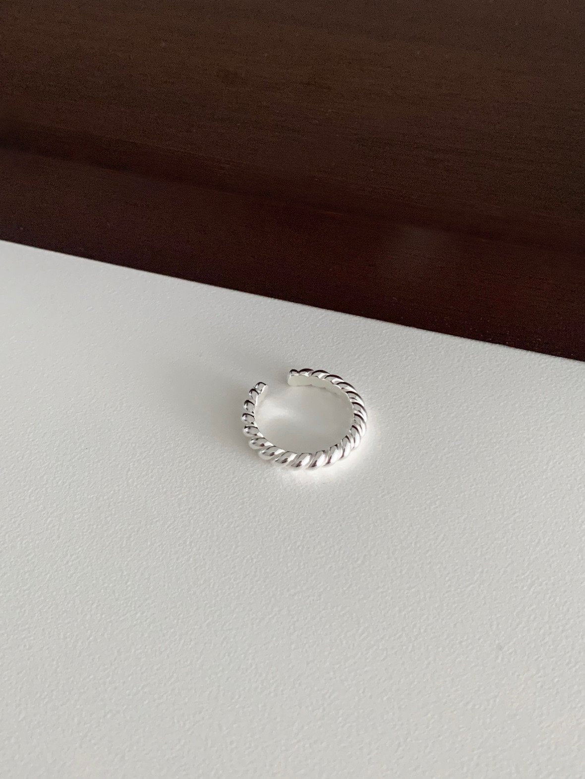 Twisted open ring