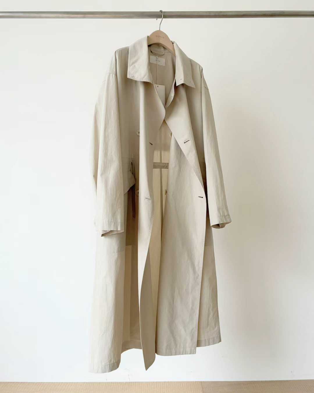 Ounce double hood trench coat