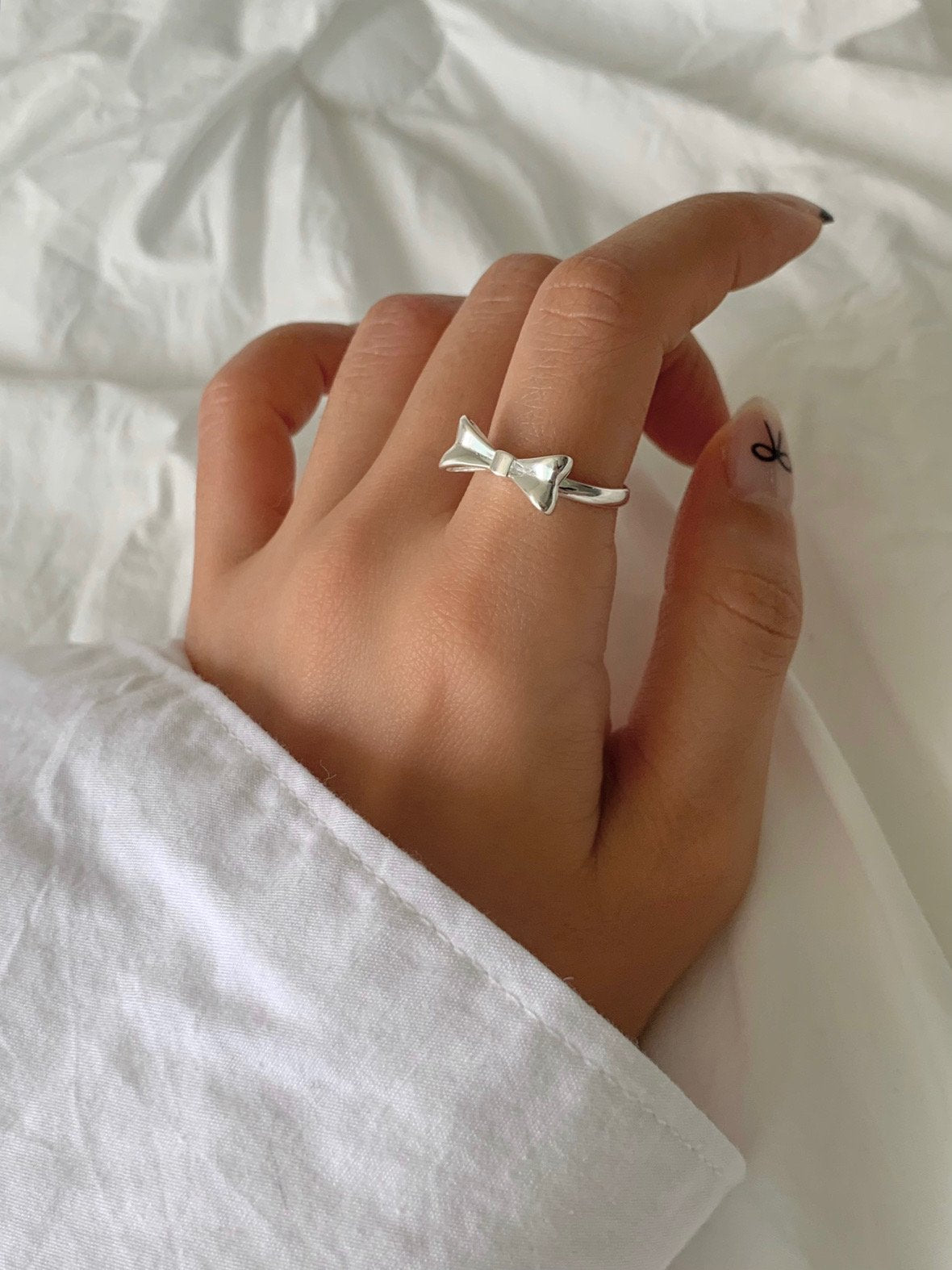 Silver ribbon ring