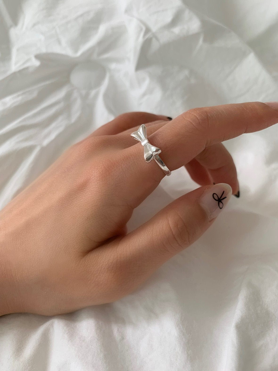 Silver ribbon ring