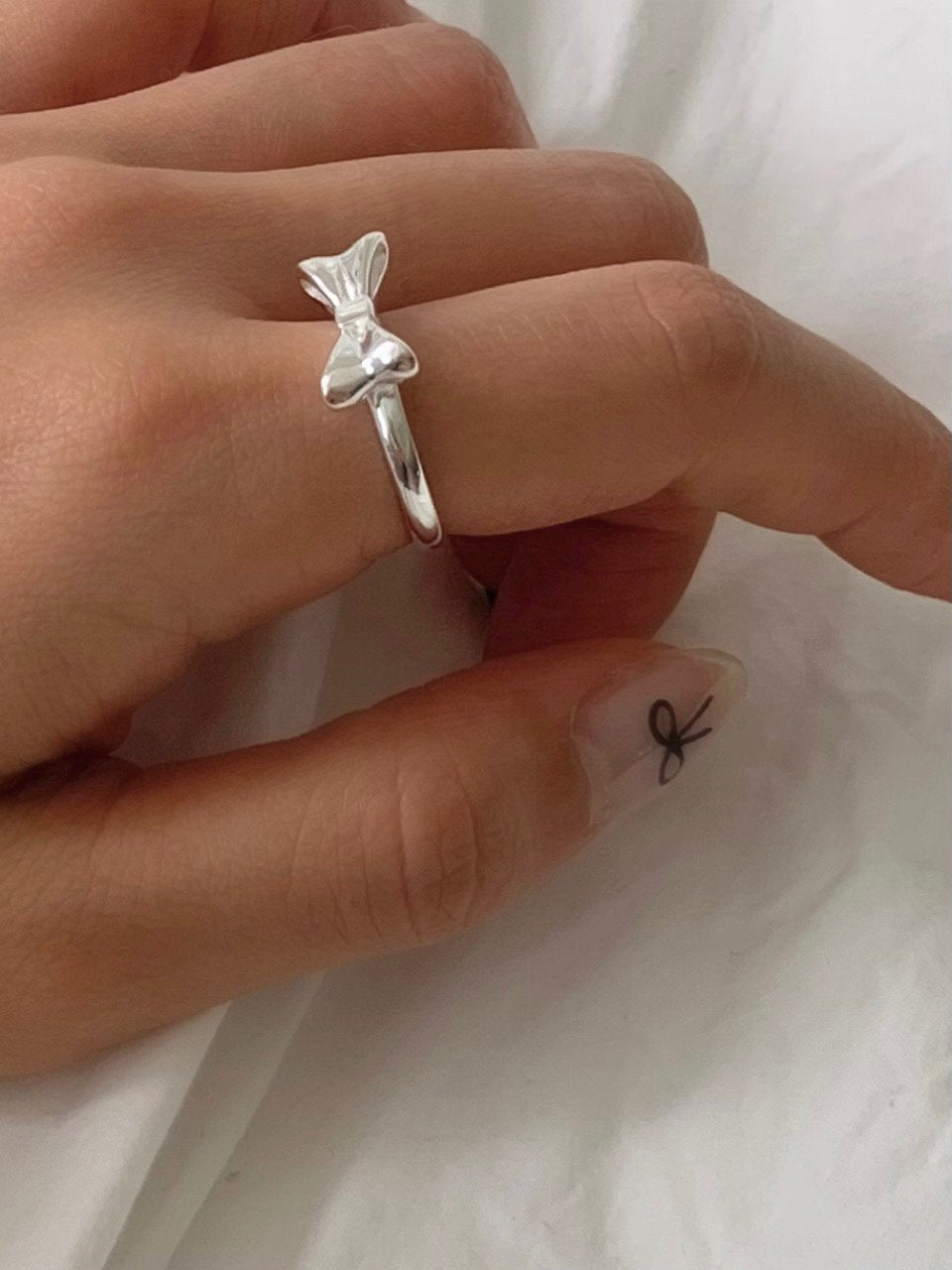 Silver ribbon ring