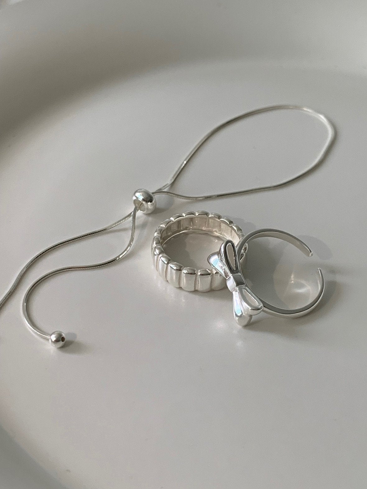 Silver ribbon ring
