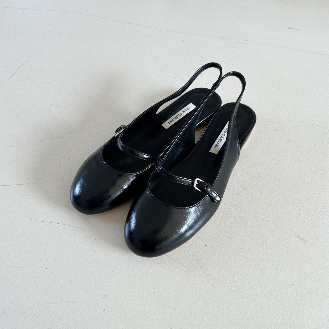 Cutie round sling back