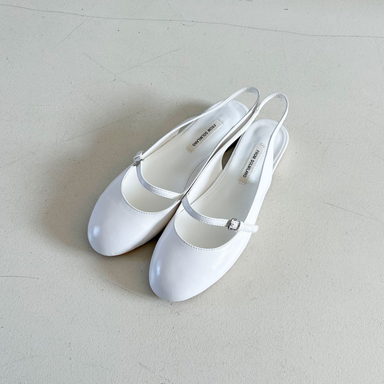 Cutie round sling back