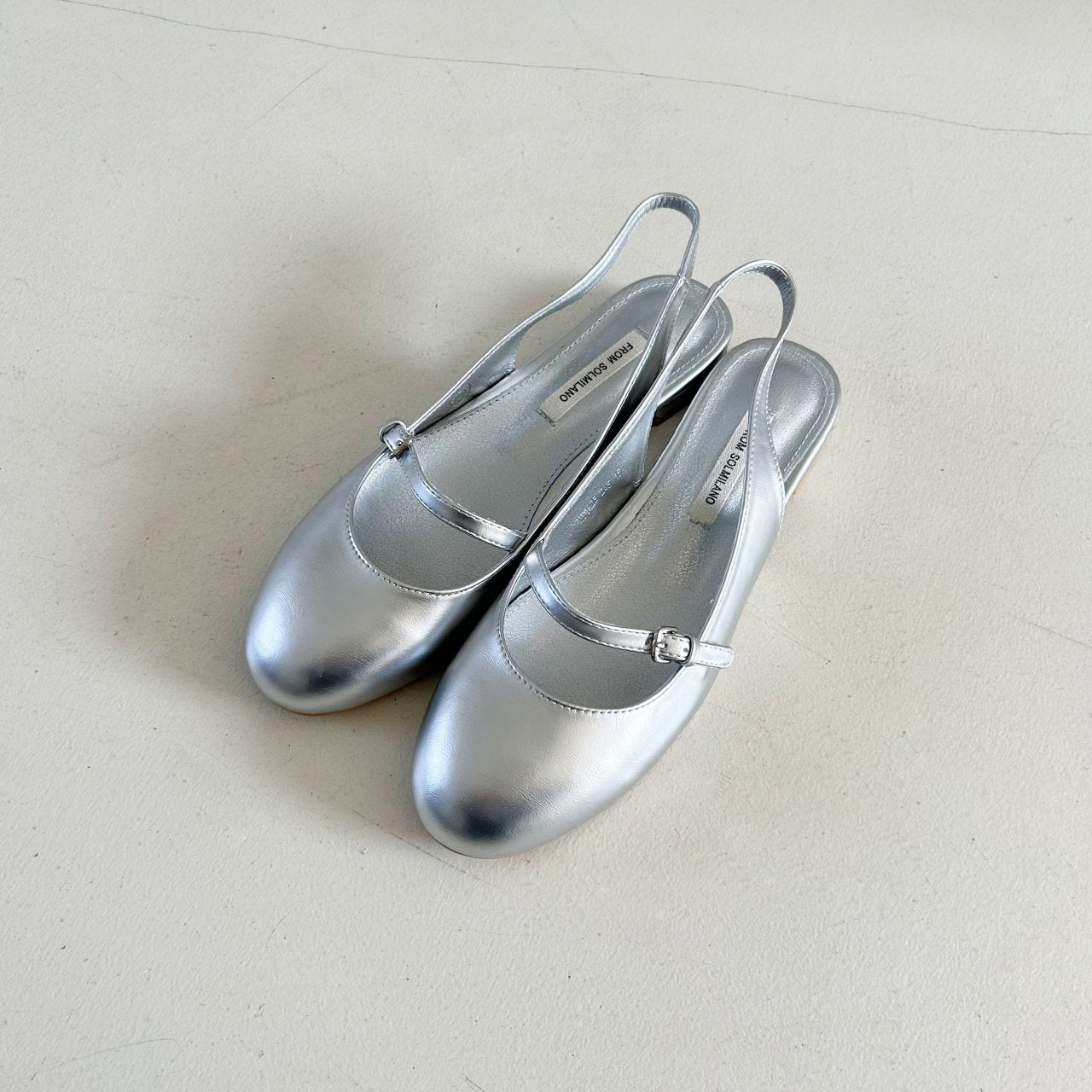Cutie round sling back