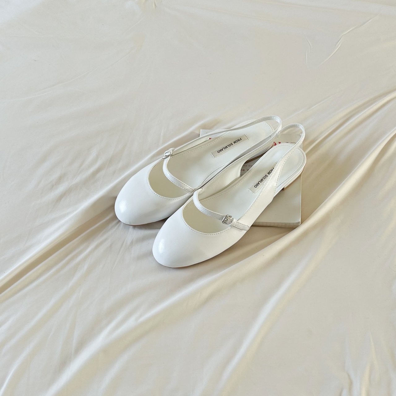 Cutie round sling back