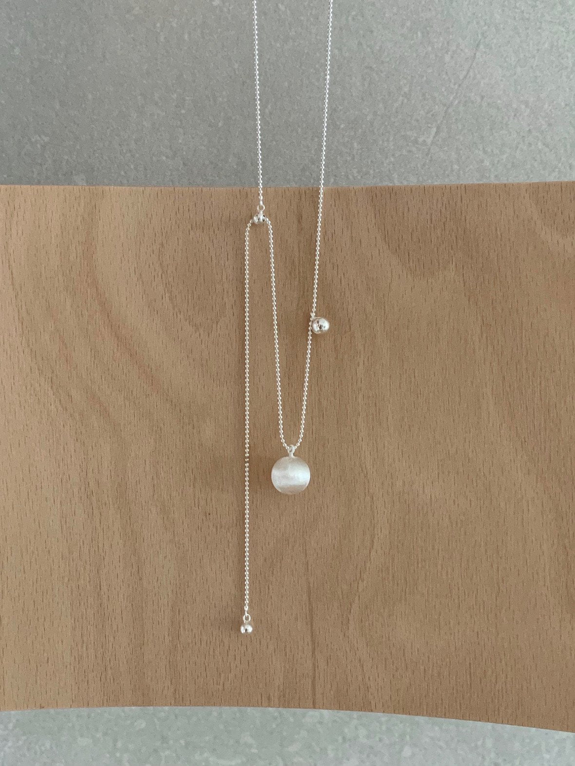 matte silver ball long necklace