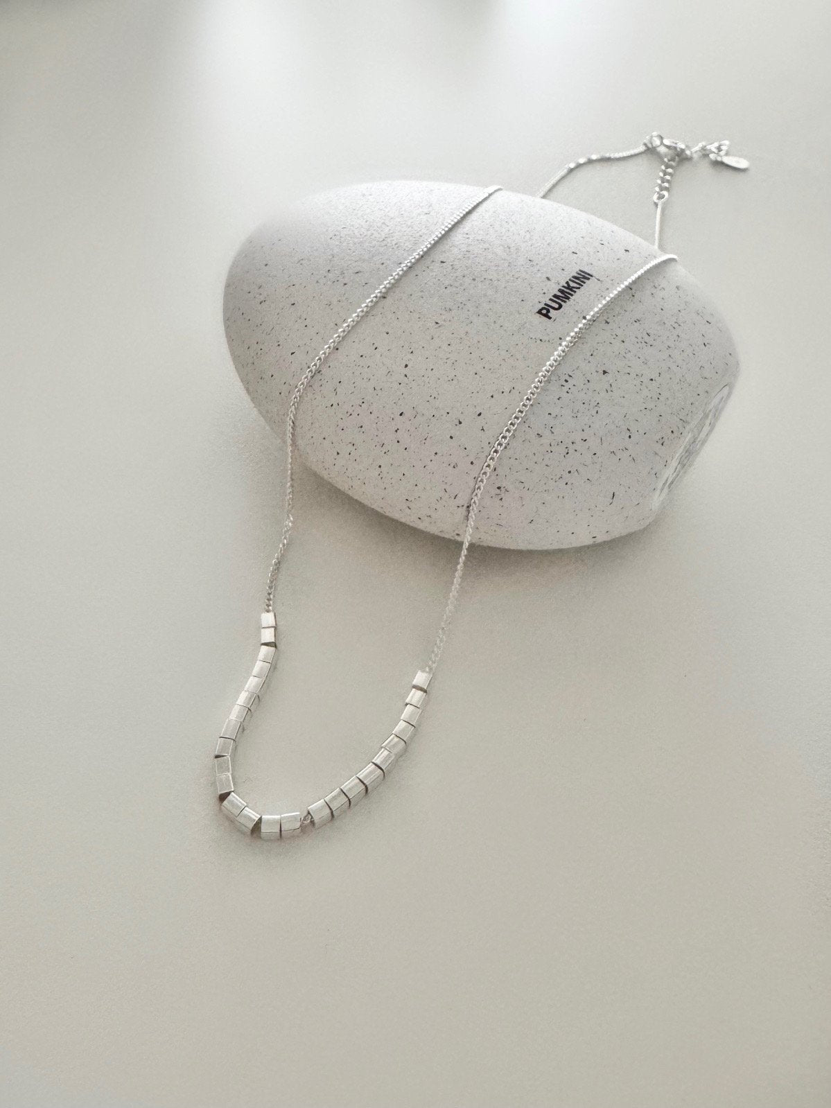 Silver charm U-neck necklace