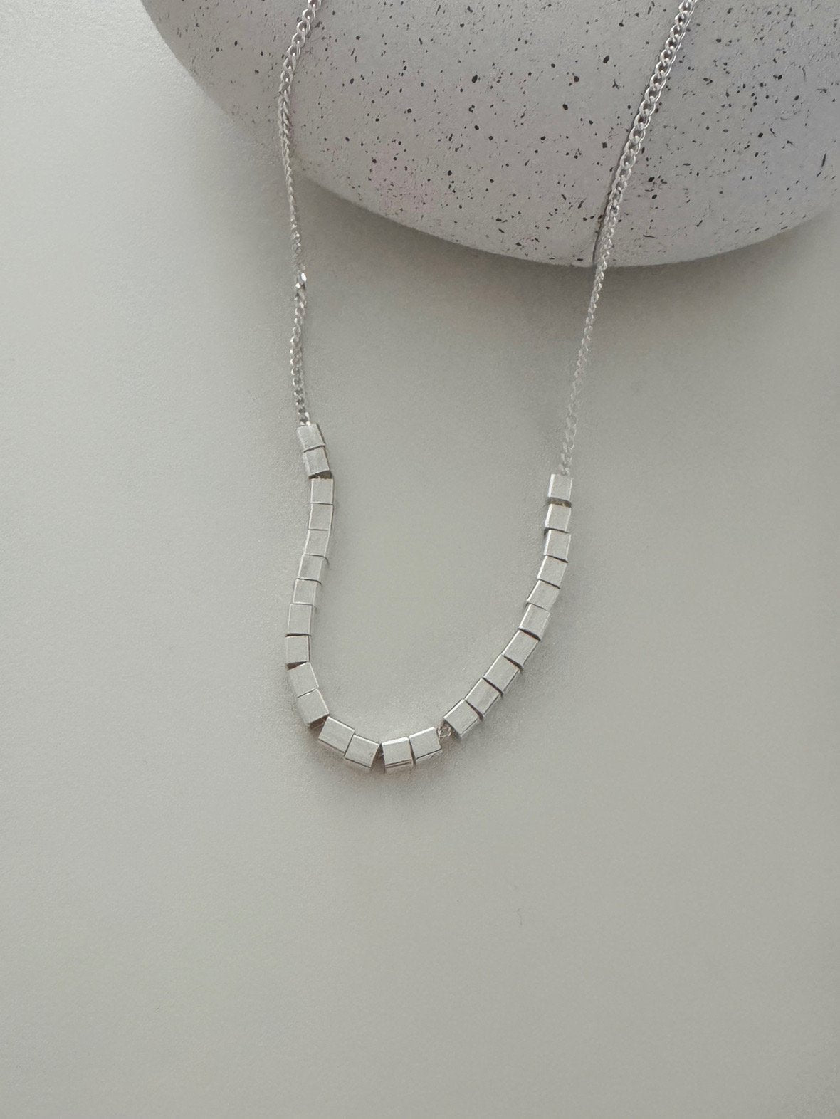 Silver charm U-neck necklace