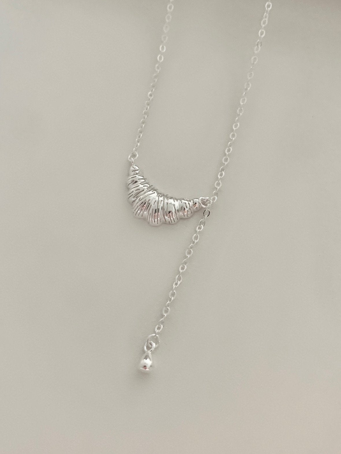 Bold croissant drop necklace