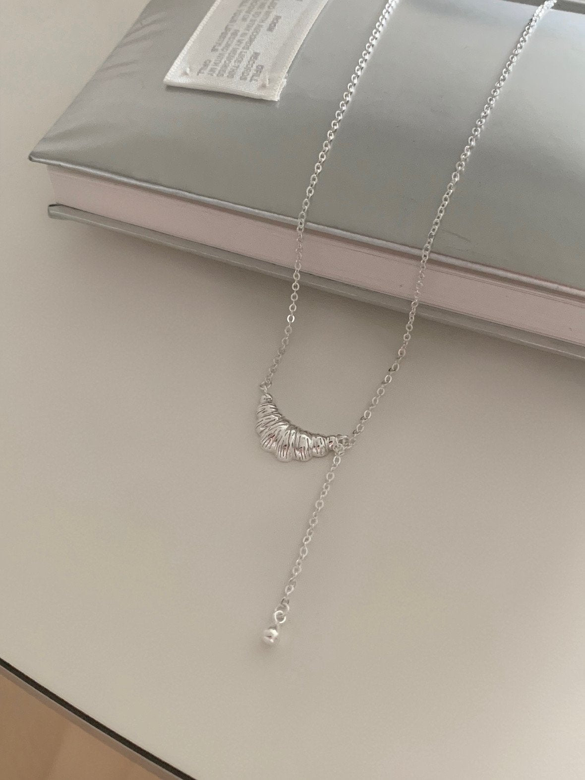 Bold croissant drop necklace