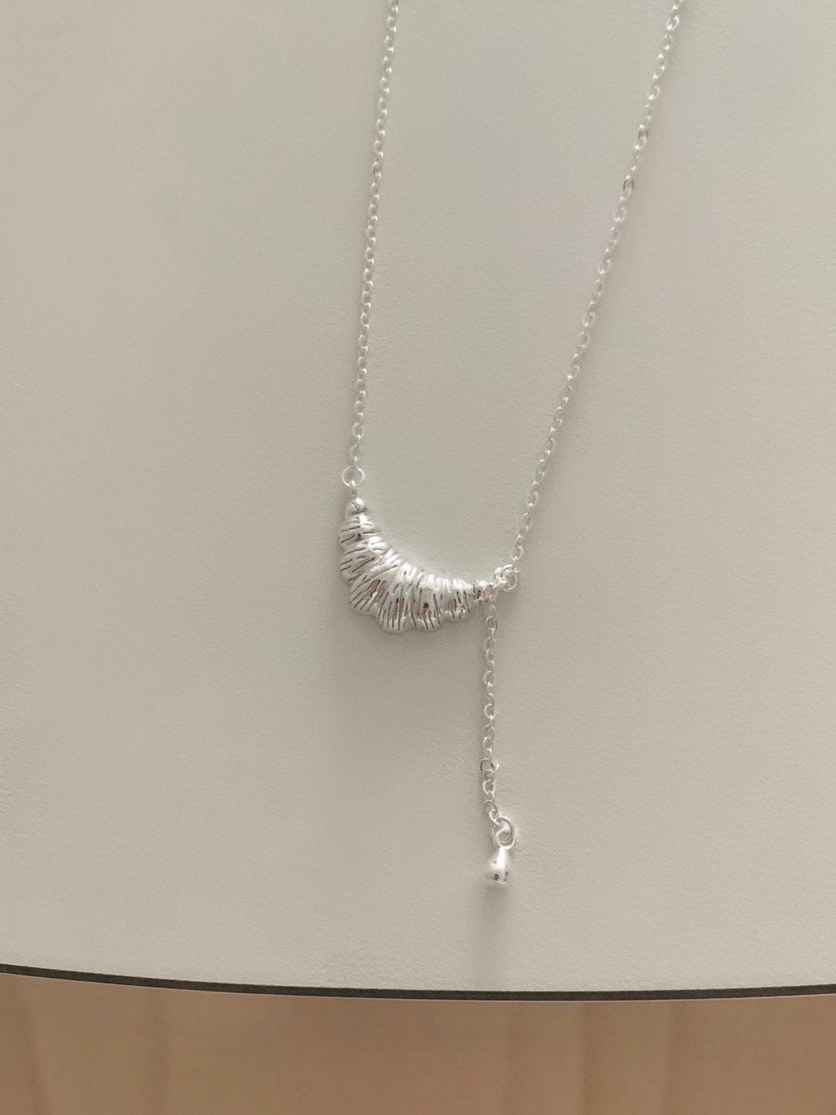 Bold croissant drop necklace