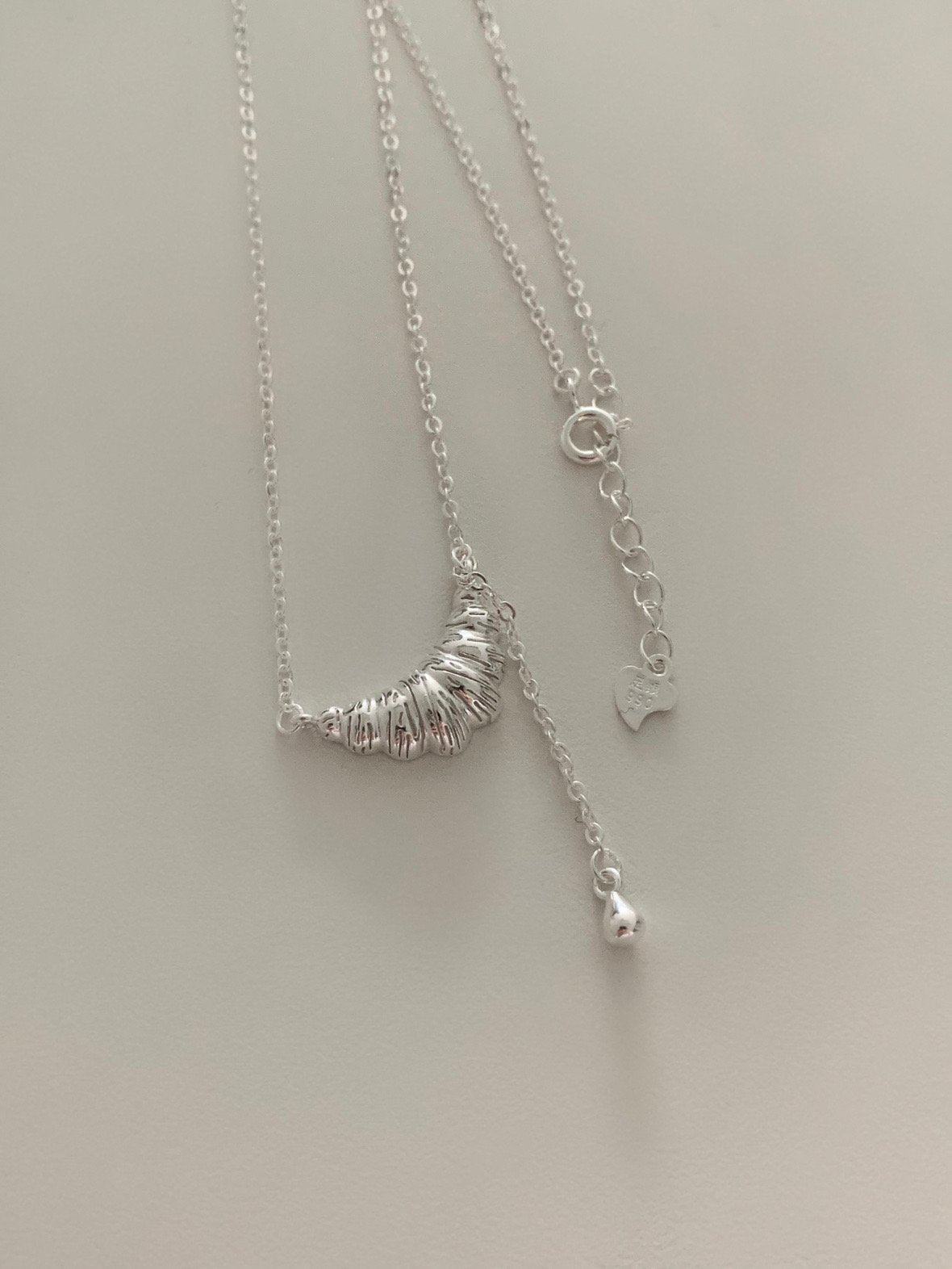 Bold croissant drop necklace