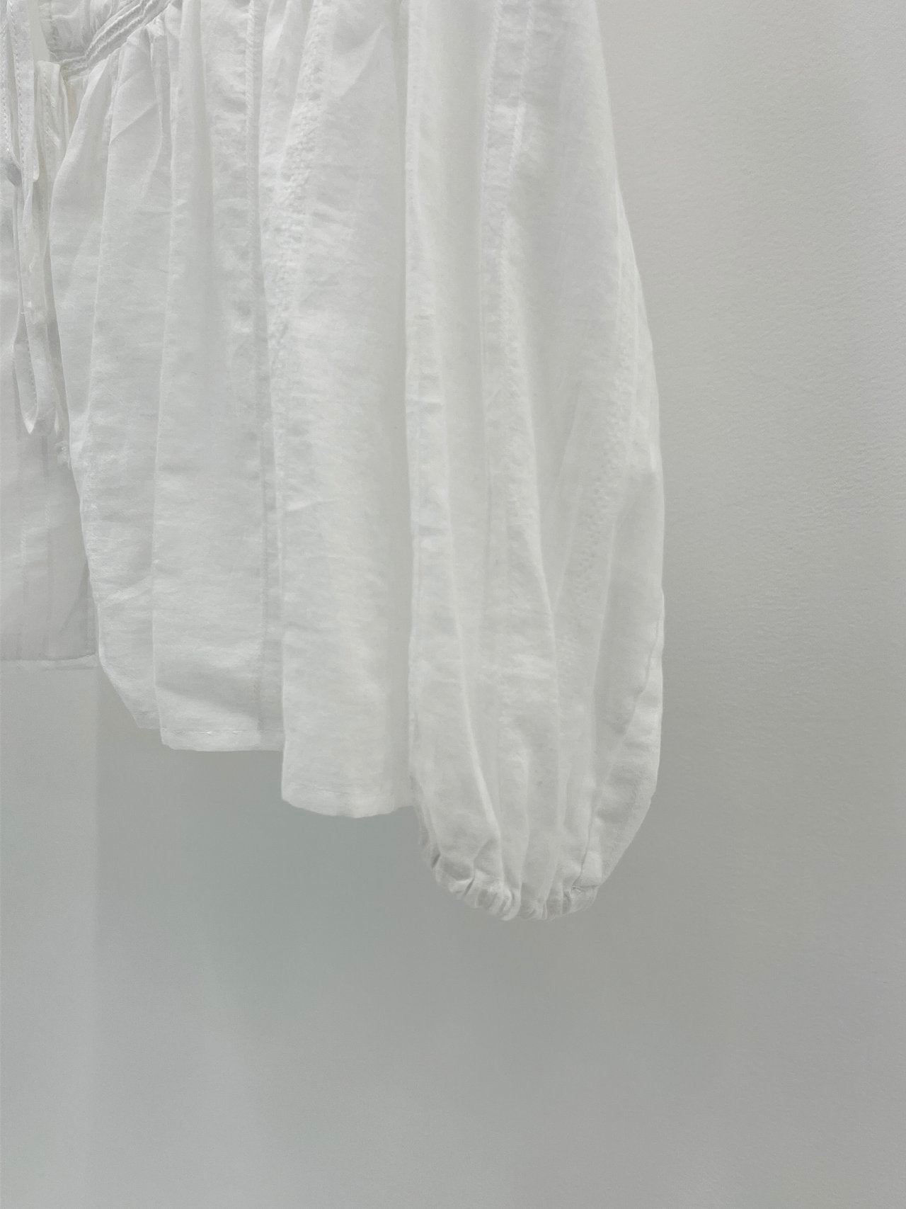 Arel V-neck string blouse