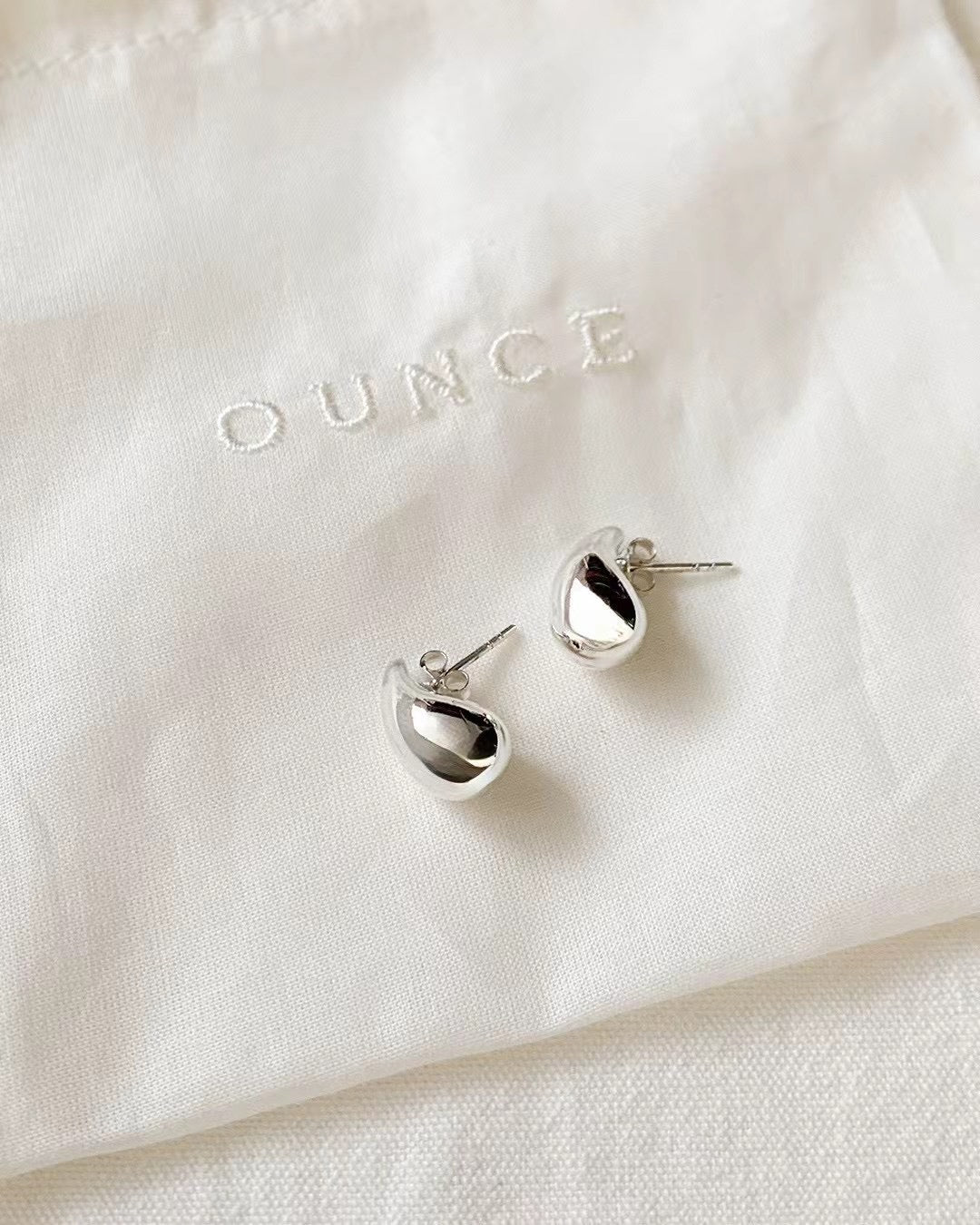 Ounce silver earring