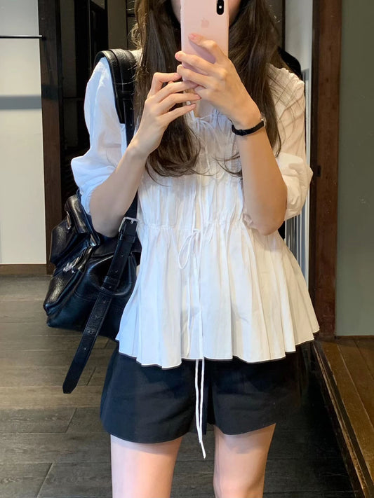 Ounce flea shirring blouse