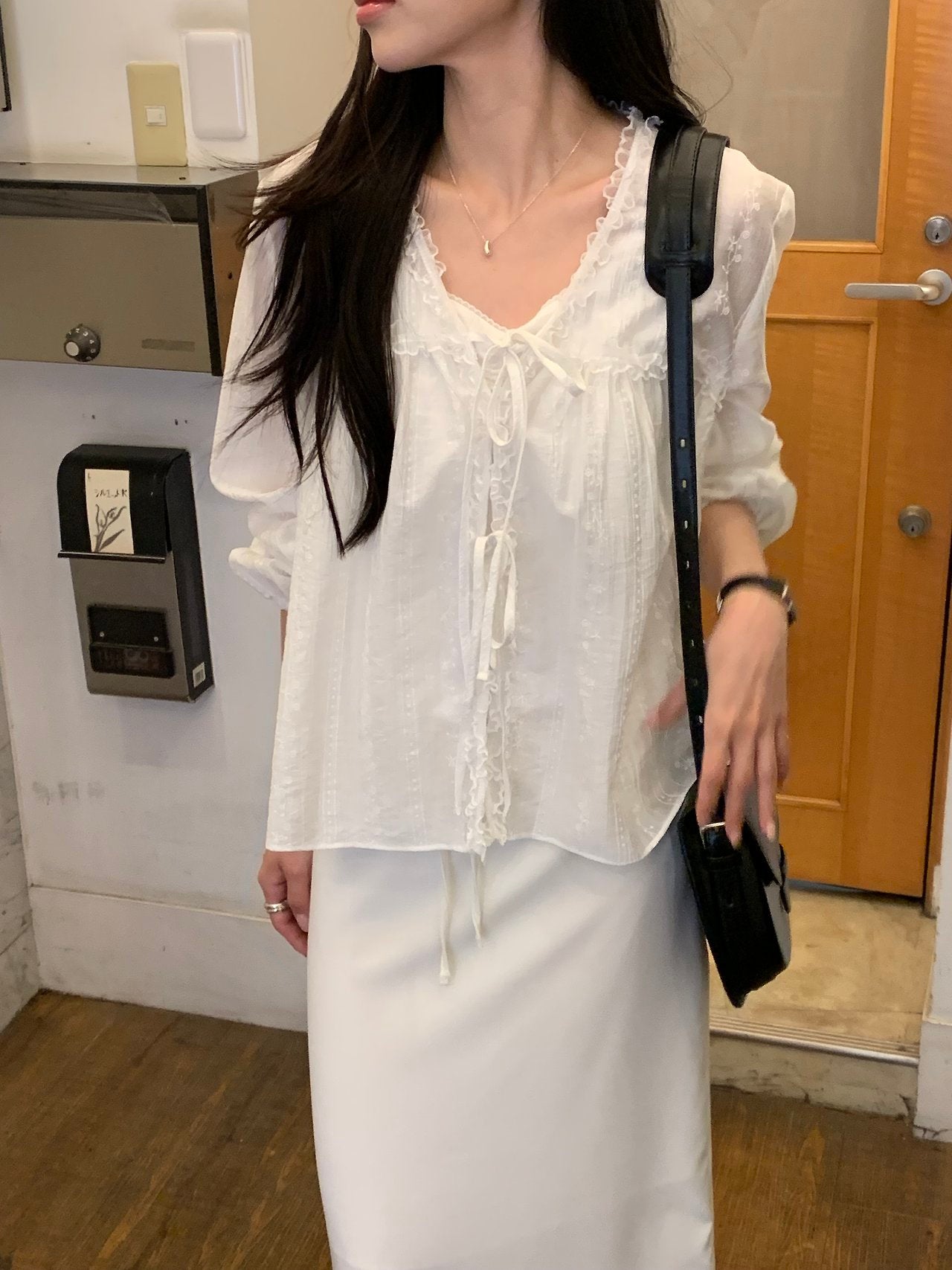 Anna V-neck frill blouse