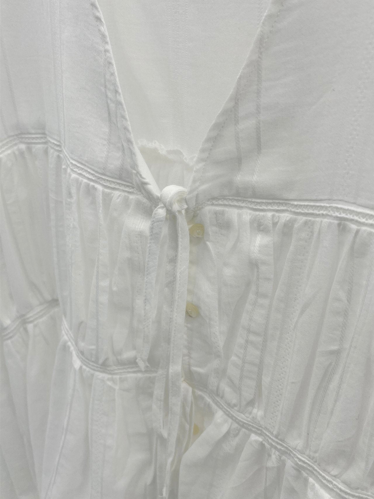 Arel V-neck string blouse