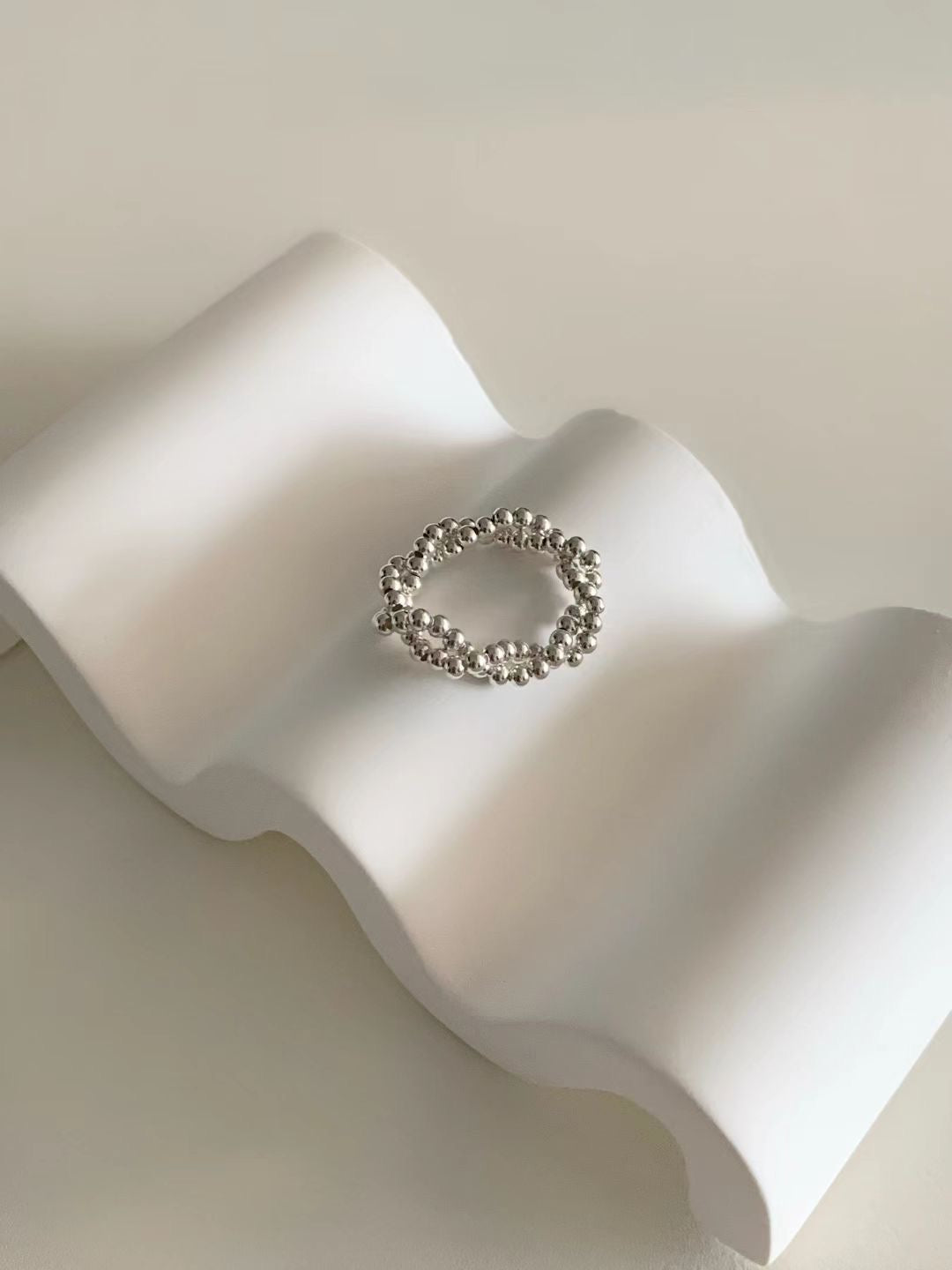 Silver ball twisted ring