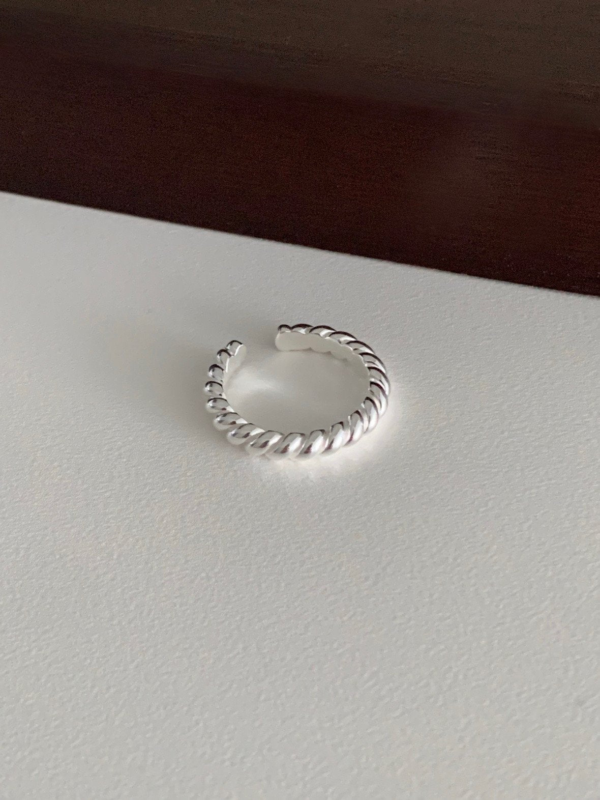Twisted open ring
