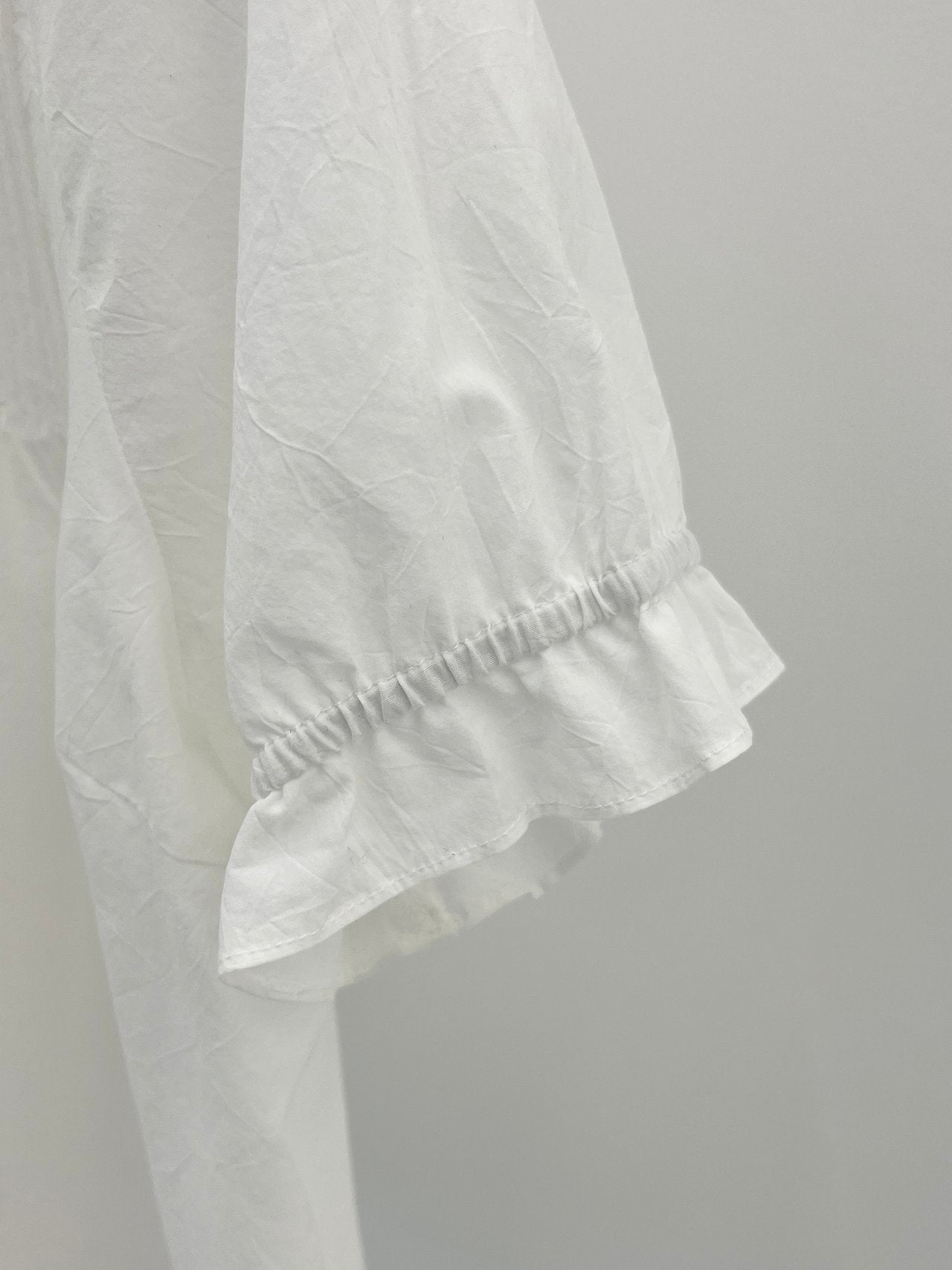 Mela frill pintuck blouse