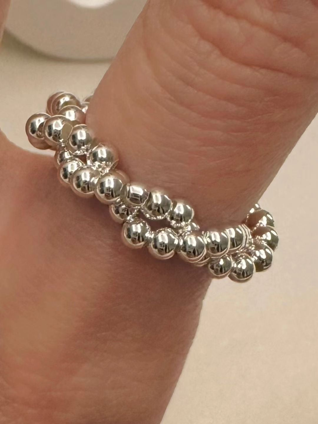 Silver ball twisted ring