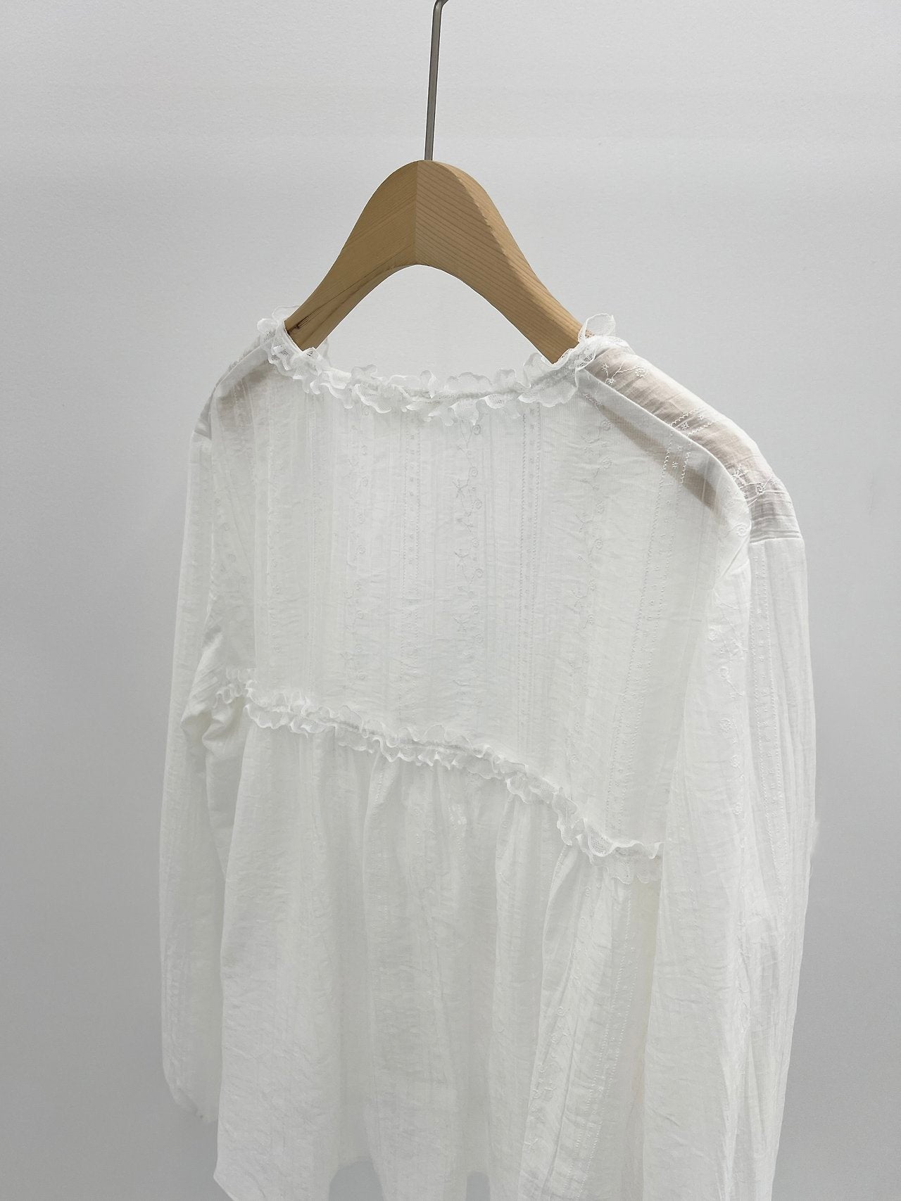Anna V-neck frill blouse