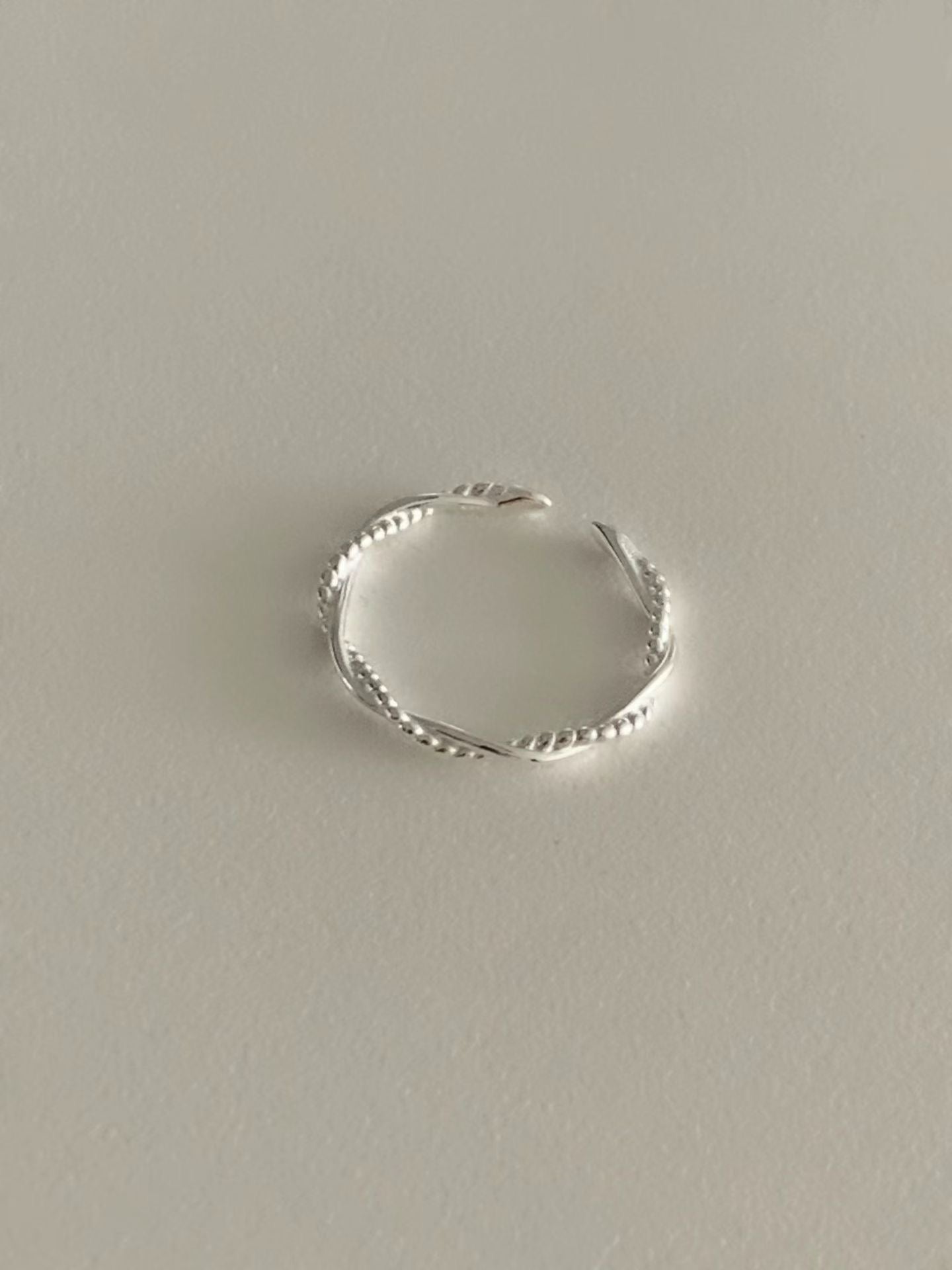 Rhyme twist open ring
