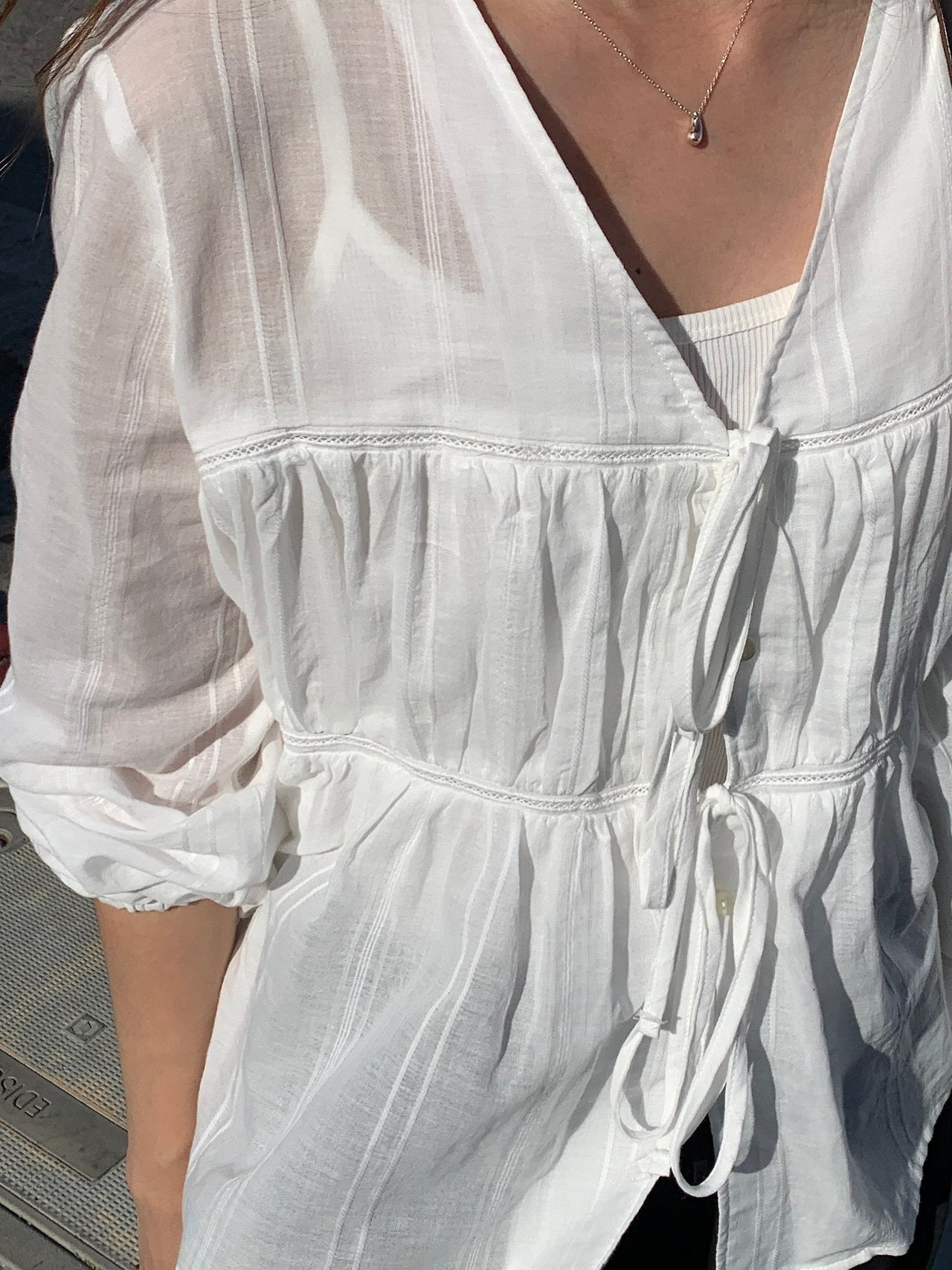 Arel V-neck string blouse