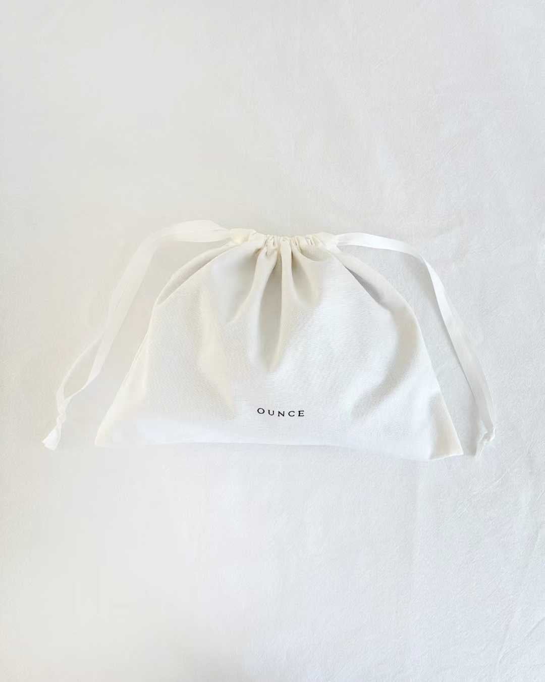 Ounce satin leather bag