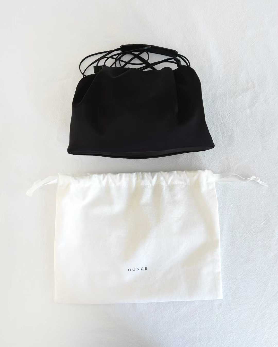Ounce satin leather bag