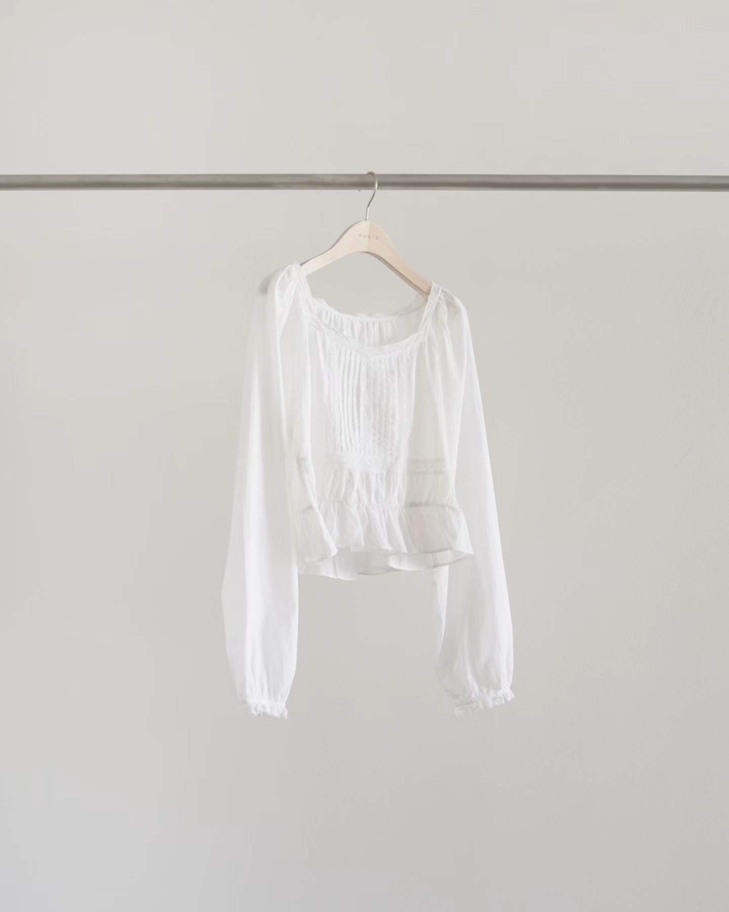 Ounce pintuck shirring blouse