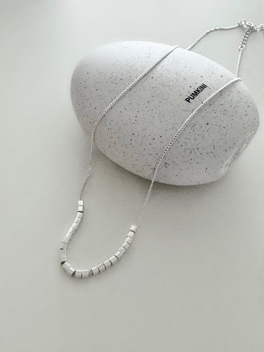 Silver charm U-neck necklace